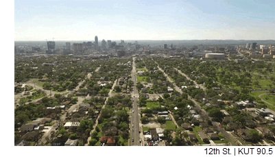 An aerial view of 12th St., with Downtown Austin in the distance.