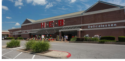 Image of retail center anchored by HEB