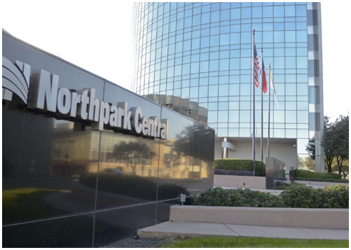 Outside sign of Northpark Central with office building in background