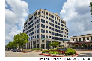 A picture of the eight-story office tower that is part of the quadrangle