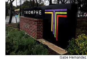 The entry sign to the Triomphe Apartments in San Antonio.