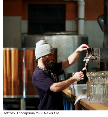 Image of bartender in craft brewery