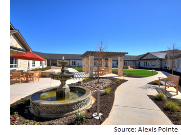 Outdoor patio and garden area at Alexis Pointe Senior Living 