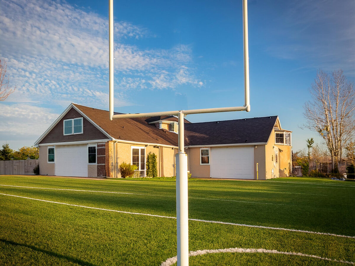 Firefly moving the goal posts from affordable home with American football goal post in foreground 23